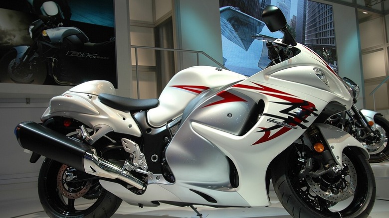 A white 2008 Suzuki Hayabusa on display at a motor show.