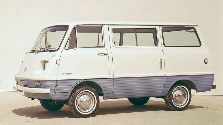 A first-generation 1966 Mazda Bongo van with a two-tone finish in a studio.