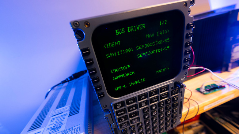 This computer that displays this path information, along with other critical flight data for the pilots in the cockpit. The screen displays "bus driver" to show that the researchers have control of it.