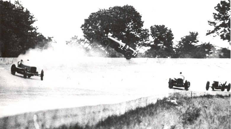 An official photo from the 1931 Indy 500 that shows car No. 32 going airborne over the banked oval circuit