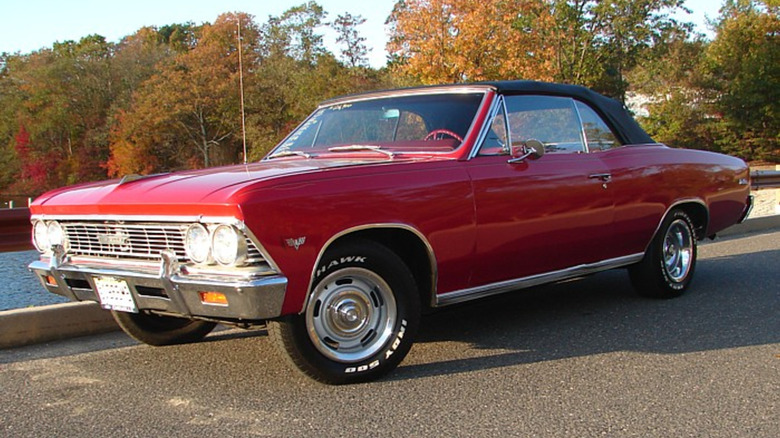 3/4 front view of a red 1966 Chevrolet Chevelle Malibu SS convertible.