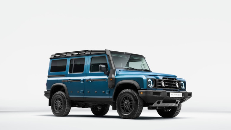 A front 3/4 shot of a blue Ineos Grenadier Station Wagon Fieldmaster against a white background