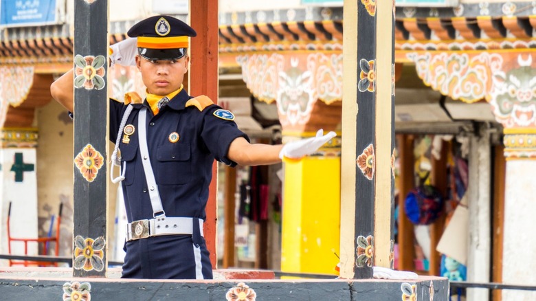 An officer directing traffic in Thimphu, Bhutan.