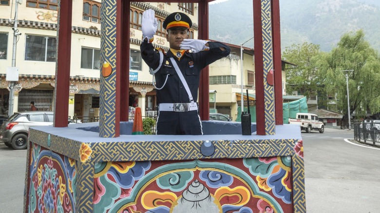 An officer directing traffic in Thimphu, Bhutan.