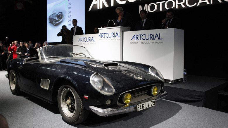 An ultra-rare Ferrari 250 GT California SWB on display at auction.