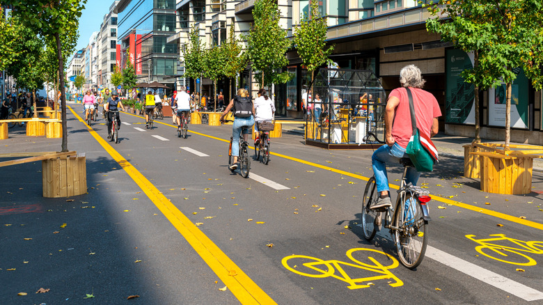 A city street turned into a bicycle path between rows of buildings