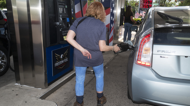 A customer pumps gas into their Toyota Prius at a Freedom Fuel Network gas station on July 8, 2026 in Dresher, Pennsylvania.