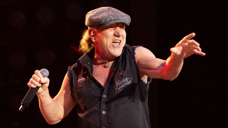 AC/DC frontman Brian Johnson performing live on stage.