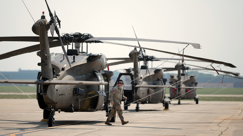 Three Black Hawks lined up at Joint Base Andrews in Maryland