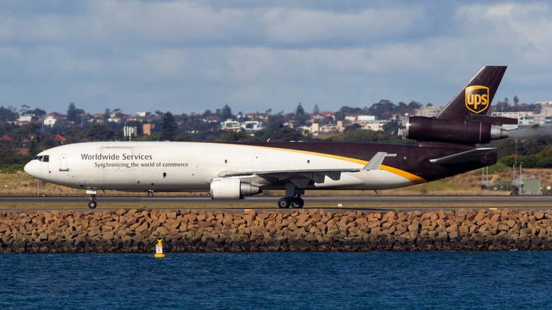 A McDonnell Douglas MD-11 operated by UPS taxiing on a runway