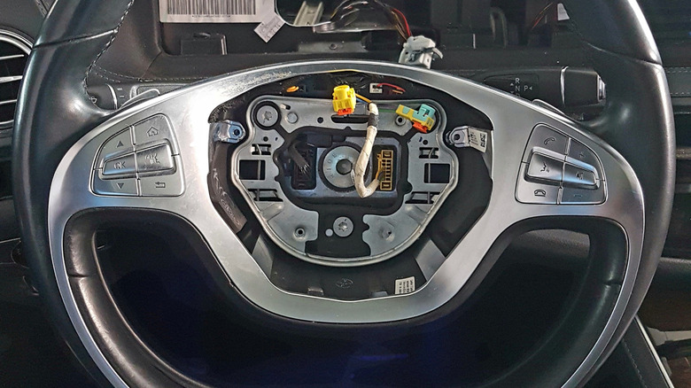 A steering wheel with a missing airbag