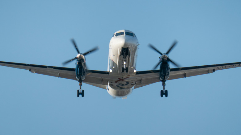 A Rex Airlines Saab 340B comes in for a landing at Sydney Kingsford Smith Airport