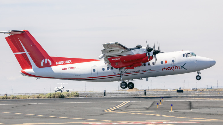 The Dash 7 aircraft that will be modified into a hybrid electric research vehicle under NASA's Electrified Powertrain Flight Demonstration project is seen taking off from Moses Lake, Washington
