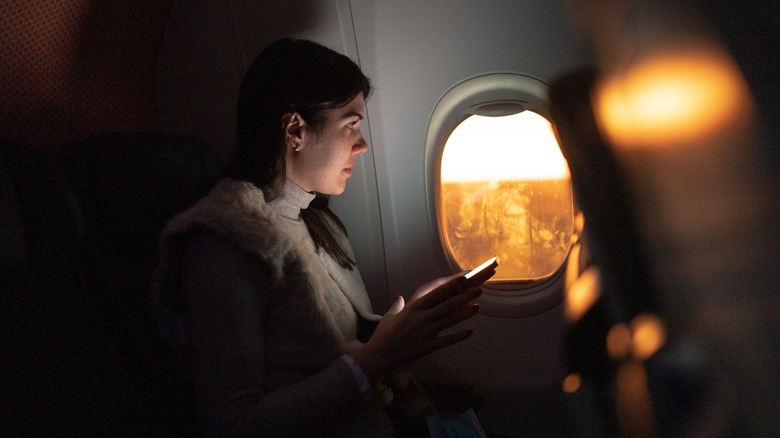 Looking out the window on an airplane