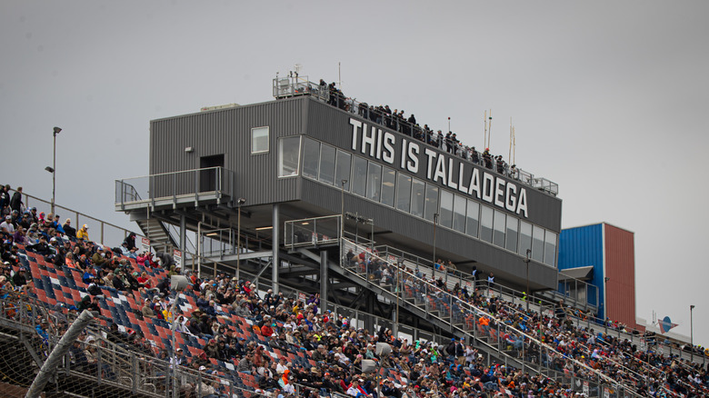 The crowd at the Talladega Superspeedway gives a thunderous applause at the conclusion of the opening ceremony for the Geico 500 race, April 21, 2024.