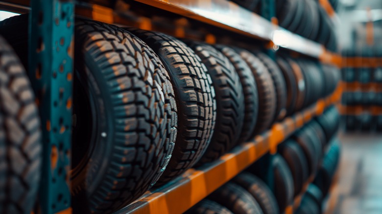 Tires displayed on a tire rack.