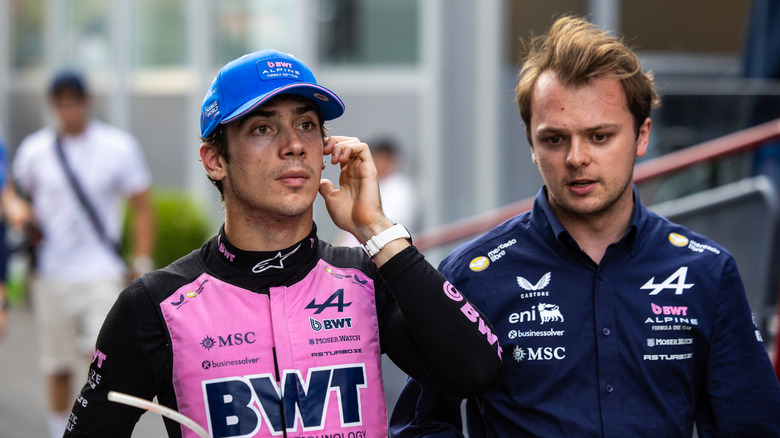 Franco Colapinto of Argentina and Alpine F1 Team walks in the paddock with a crew member during qualifying ahead of the F1 Grand Prix of Azerbaijan at Baku City Circuit on September 25, 2026 in Baku, Azerbaijan.