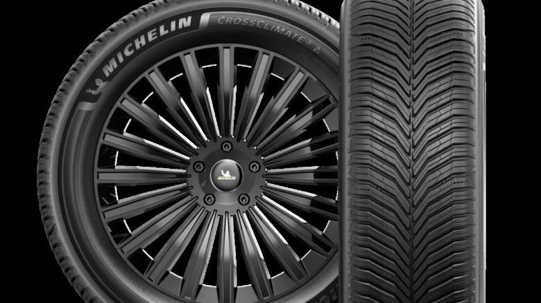 A front sidewall and tread pattern view of the Michelin CrossClimate3 Sport tires over a black background