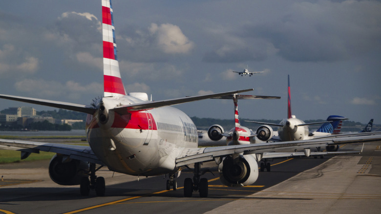 An American Airlines Boeing 737 and other airplanes wait to depart from Ronald Reagan Washington National Airport on May 27, 2026 in Arlington, Virginia.