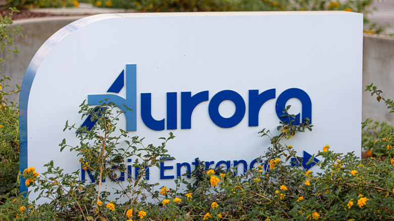 Mountain View, CA US - March 23, 2026: as sign in front of Aurora Innovation, Inc. facility. Aurora is a leading developer of self-driving technology, particularly focused on autonomous trucking.