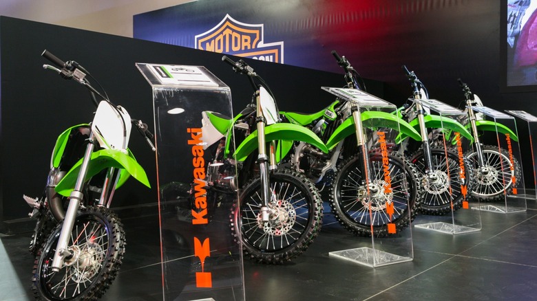 A lineup of Kawasaki's off-road motorcycles.