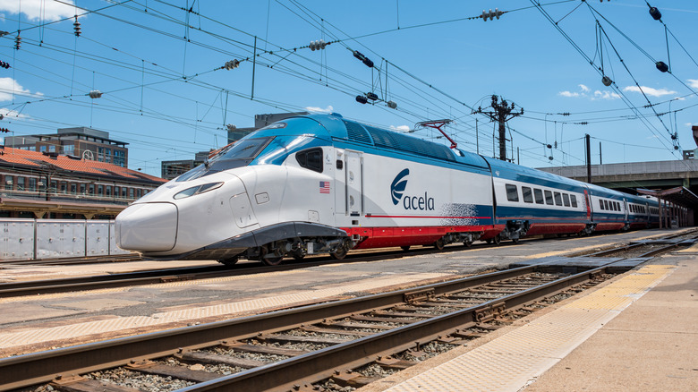 Amtrak NextGen Acela train sits at one of its urban stops in the Northeast corridor.