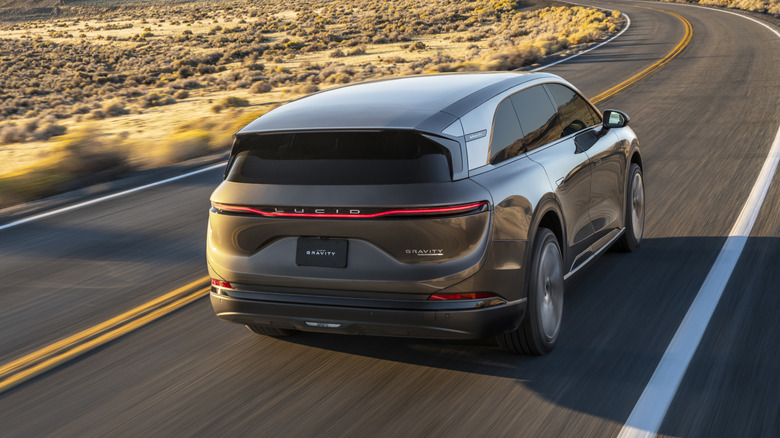 Rear 3/4 view of a green Lucid Gravity