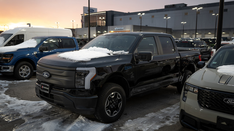 A Ford F-150 Lightning is offered for sale at a Ford dealership on December 15, 2025 in Chicago, Illinois.