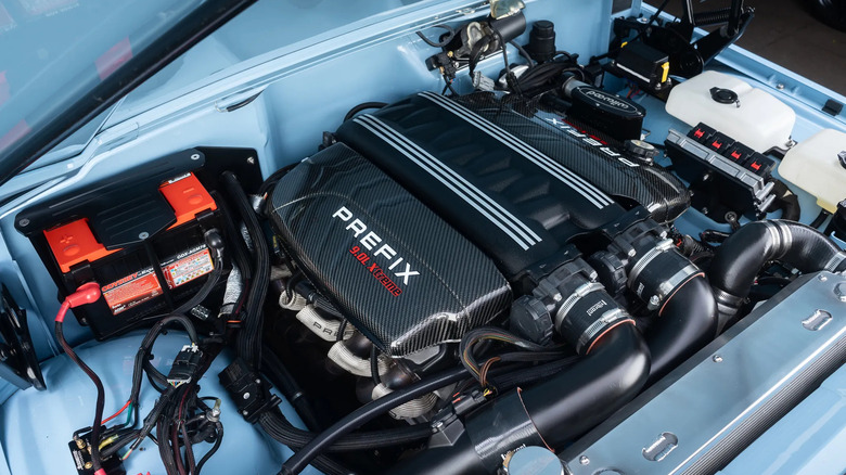 A look under the hood at the 9-liter V10 with its carbon fiber valve covers in the pristine engine bay