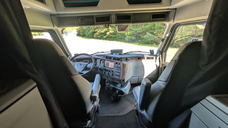 the interior of a Volvo VNL Semi truck parked at the Michelin Laurens Proving Grounds on a sunny day