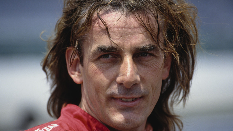 The headshot of Arie Luyendyk