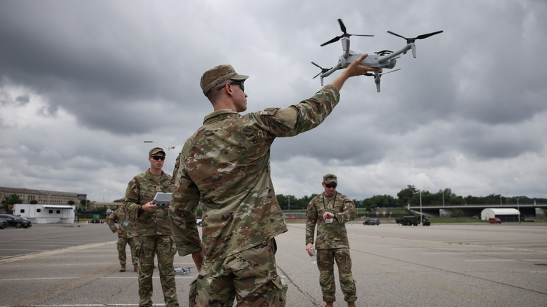 A U.S. Army soldier hand-launches a drone during the June 14, 2025 parade in Washington, D.C.