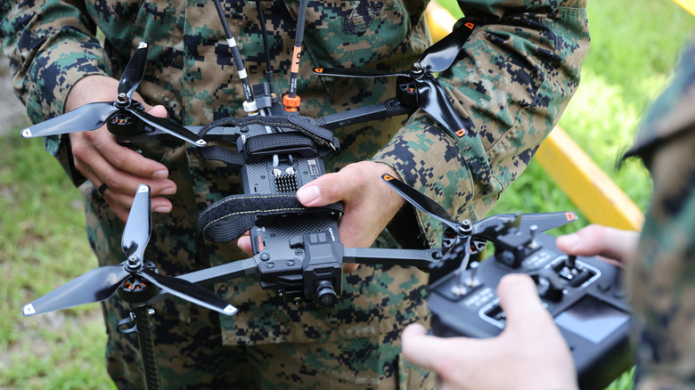 U.S. Marines prepare to hand-launch an FMV drone during an exercise in South Korea in 2026