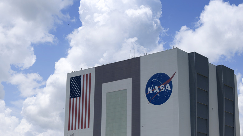 NASA's Vehicle Assembly building is seen as the SpaceX Falcon 9 rocket and Dragon spacecraft are being prepared to launch from Complex 39A at NASA's Kennedy Space Center on June 10, 2025, in Cape Canaveral, Florida.