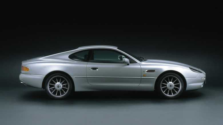 studio photo of a grey Aston Martin DB7