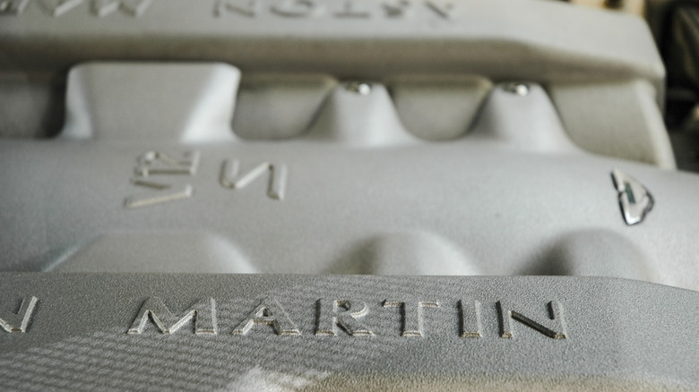 Up close of the engine bay of an Aston Martin V12 Vantage S