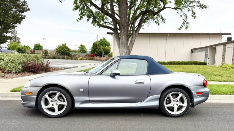 2003 Mazda MX-5 Miata 'Shinsen' edition driver's side with top up image