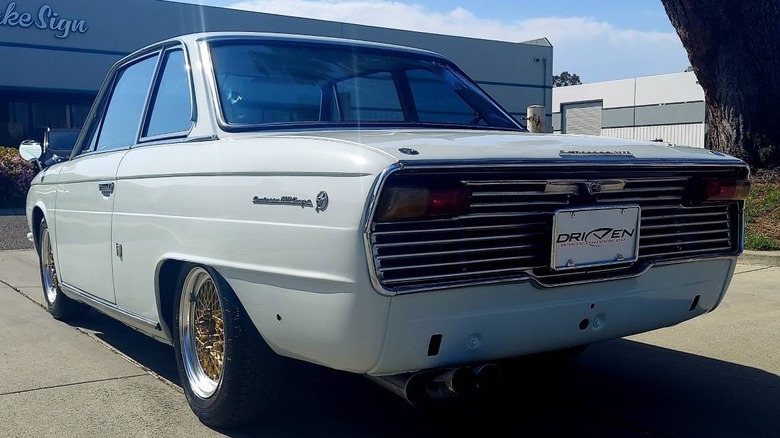 1967 Hino Contessa rear three-quarter image