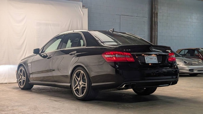 2011 Mercedes E63 AMG rear three-quarter image