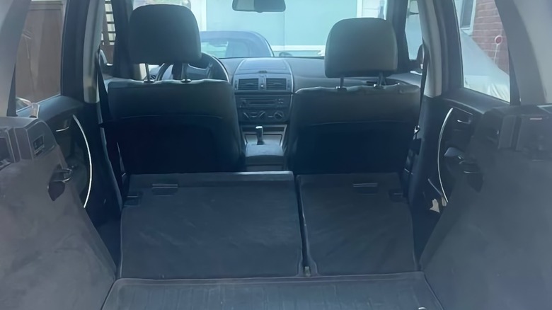 2005 BMW X3 interior with rear seats folded