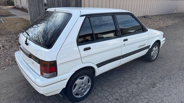 1994 Subaru Justy 4WD rear three-quarter image