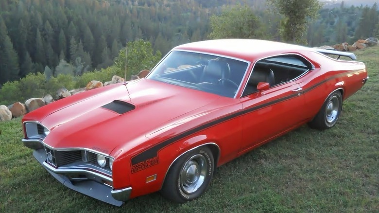 1971 Mercury Cyclone Spoiler parked on a grassy hillside