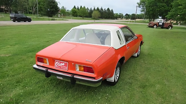 1976 Pontiac Sunbird rear three-quarter parked in a field
