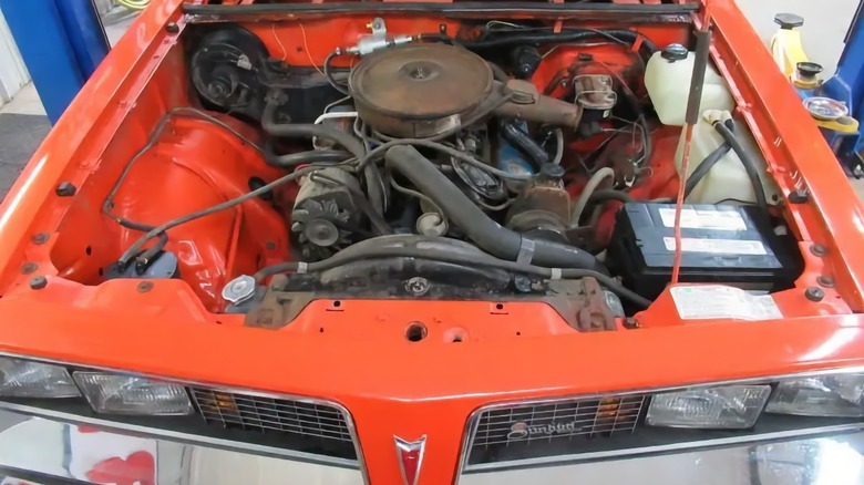1976 Pontiac Sunbird engine compartment with V6 image
