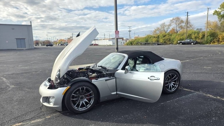 2007 Saturn Sky Redline side image with hood and doors open