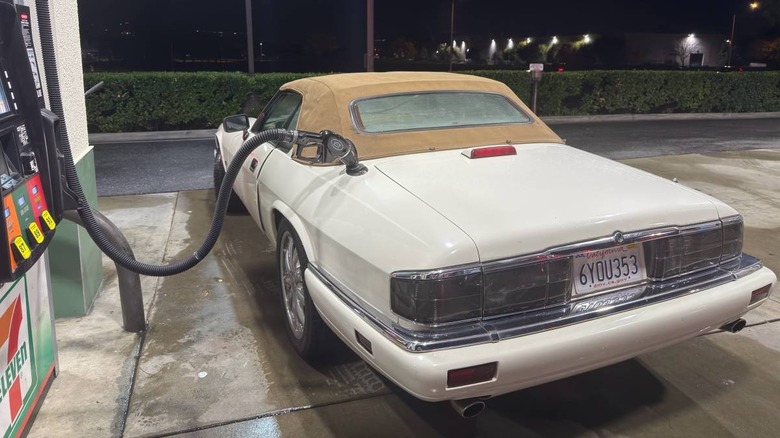 1995 Jaguar XJS convertible getting refueled