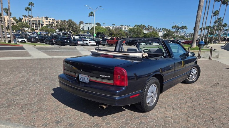 1991 Oldsmobile Cutlass Supreme convertible rear end with top down image