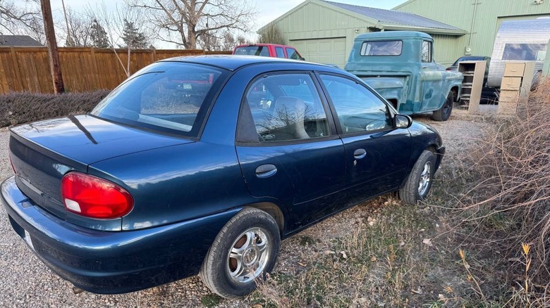 1998 Chevrolet Metro rear three-quarter image