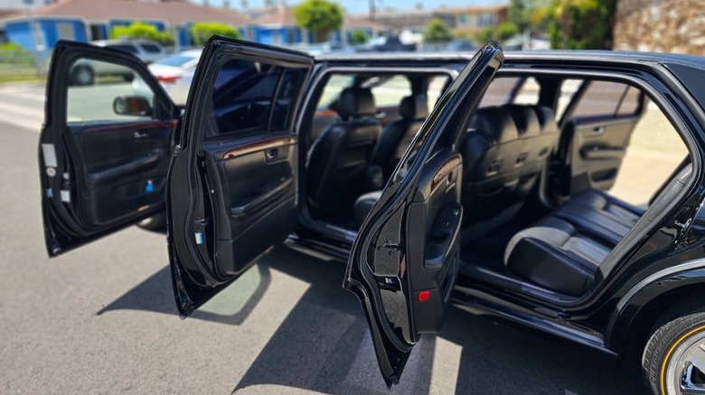 2008 Cadillac DTS six-door limo driver's side doors open image