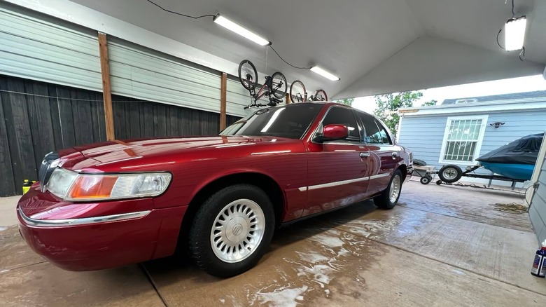 1999 Mercury Grand Marquis parked in a carport image
